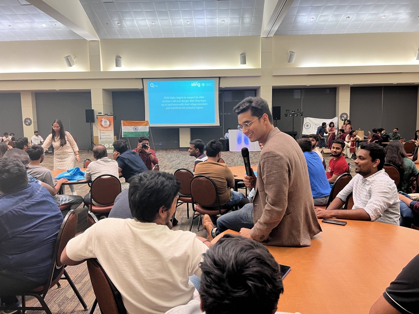 Sudhanshu speaking with students on campus